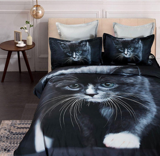 Black cat-themed quilt cover set with large cat face print and two matching pillowcases