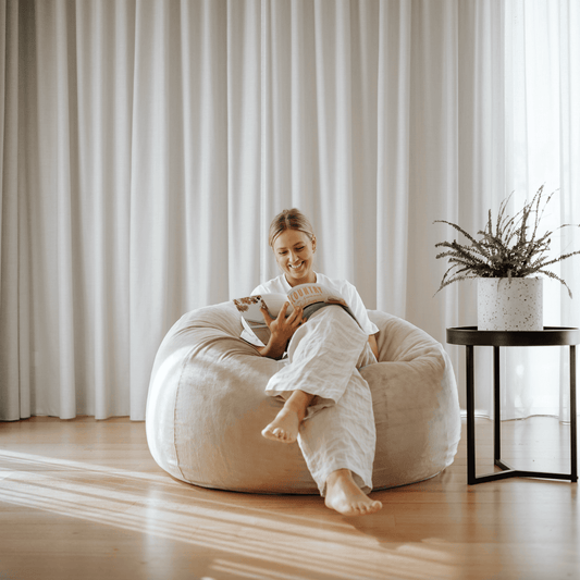 Champagne latte faux fur bean bag chair with rounded seat