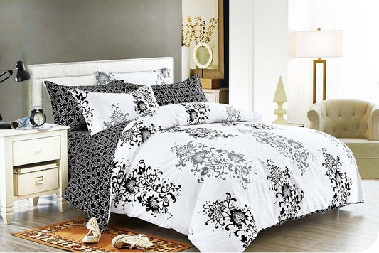 Queen duvet quilt cover set in white with black ornate floral pattern and matching pillowcases