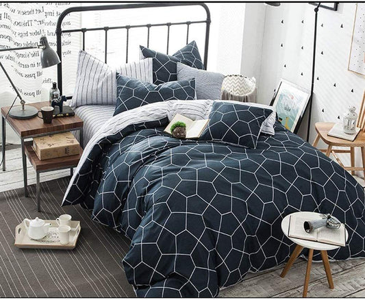 Geometric hexagon duvet cover set in navy and light blue with matching pillowcases