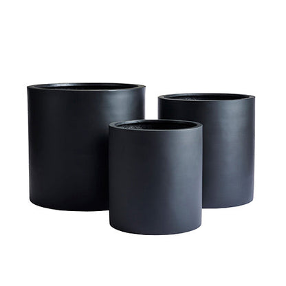 Set of three dark charcoal cylindrical plant pots with smooth finish