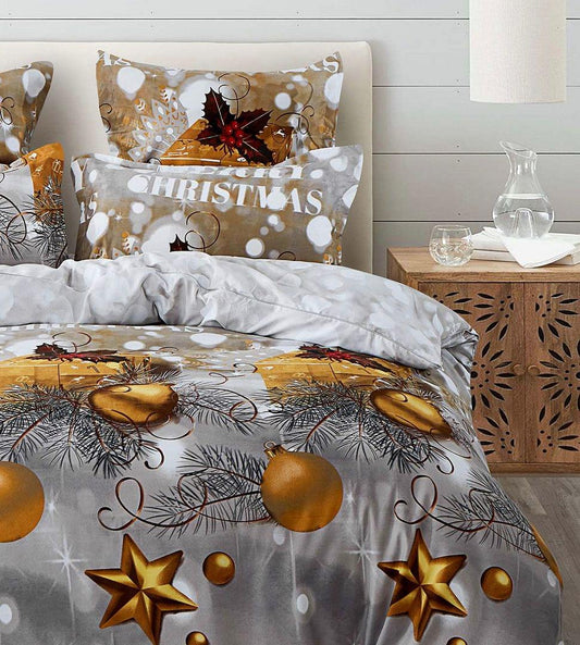 Gray holiday duvet cover with gold stars, ornaments, and “CHRISTMAS” text on pillow
