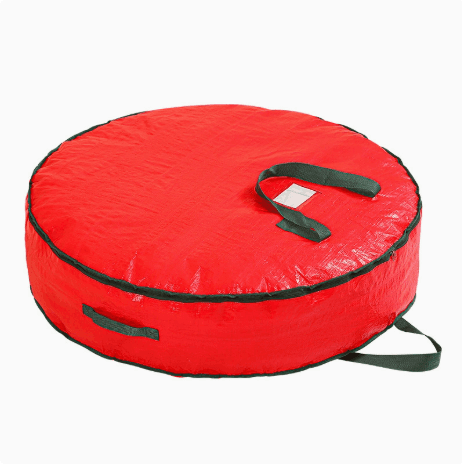 Red round wreath storage bag with carry handles and zipper closure