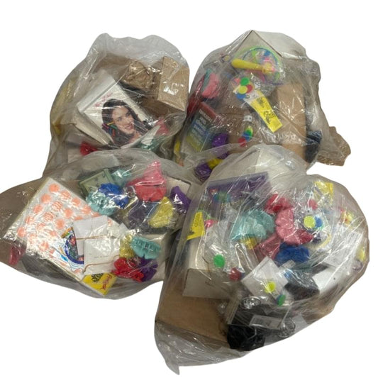 Assorted lucky-dip toy bundles in clear plastic wrap