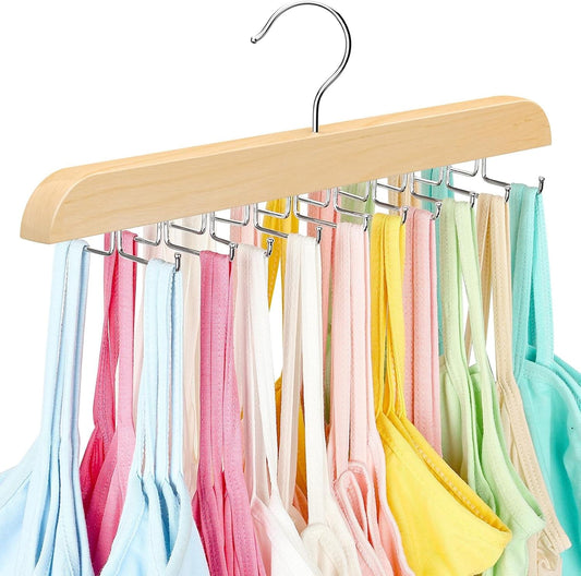 Wooden clothing hanger organizer with multiple chrome hooks holding folded garments