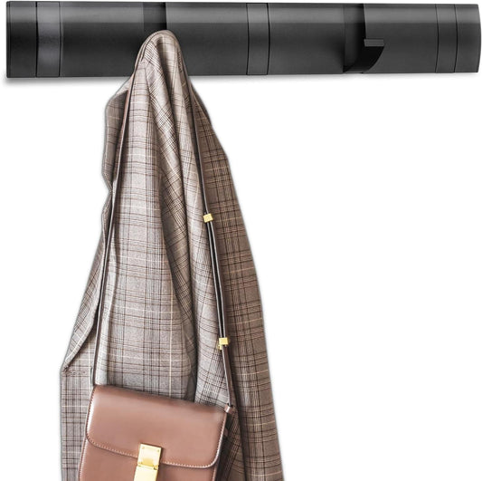 Black coat rack wall mount with 5 retractable hooks holding a plaid coat