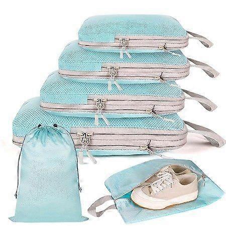 Light blue packing cubes set with mesh tops, compression zippers, shoe bag and laundry bag
