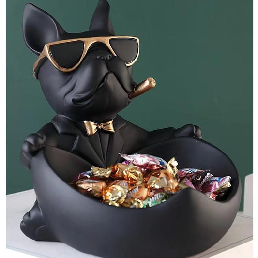 Black resin French bulldog figurine key bowl with sunglasses and gold bow, holding candies