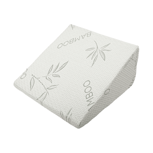 Wedge memory foam neck and back support pillow with white cover and green leaf print