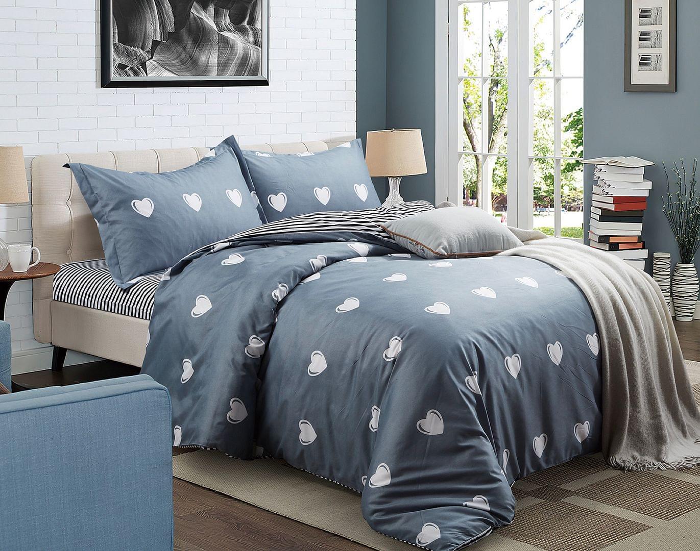 Queen duvet cover set in blue with white heart pattern and matching pillowcases