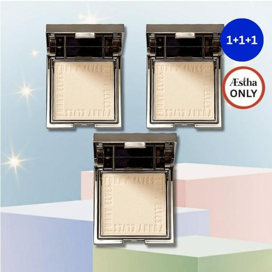 Pressed foundation powder compact with light beige powder in silver mirrored case