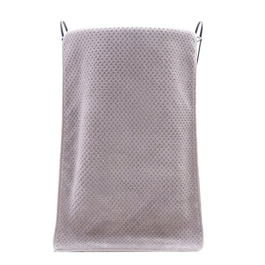Gray bath towel, rectangular folded with corner hanging loops