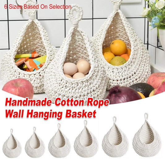 Cotton rope wall hanging storage basket with woven teardrop shape, filled with produce