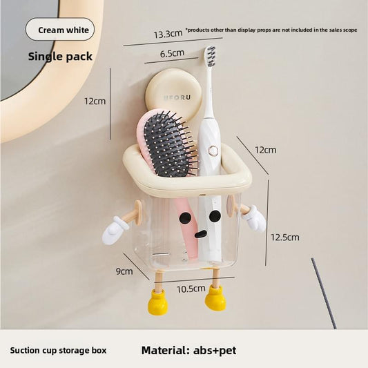 Wall-mounted suction cup toothbrush holder with clear caddy and cream base, drainage slots