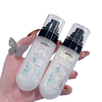 Two clear facial mist bottles with black pumps, held in hands