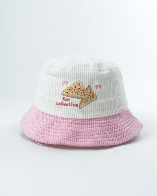 Pink-and-white ribbed bucket hat with fairy bread appliques on front panel.