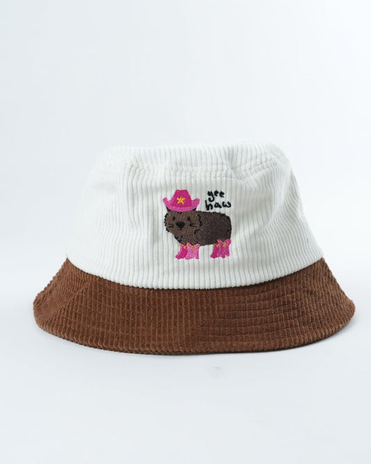 WOMBAT Wrangler bucket hat, white knit top, brown brim, wombat graphic patch