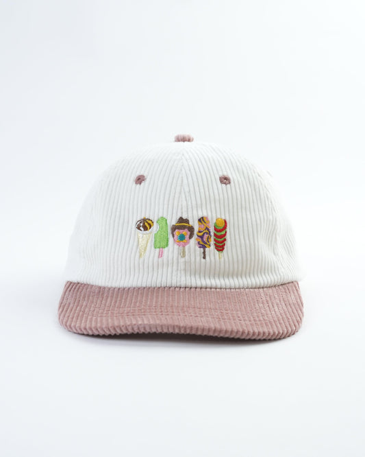 Embroidered bucket hat, white crown with colorful icon row and pink ribbed brim