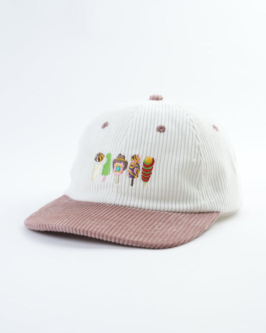 White kids baseball cap with pink striped brim and colorful ice cream row embroidery
