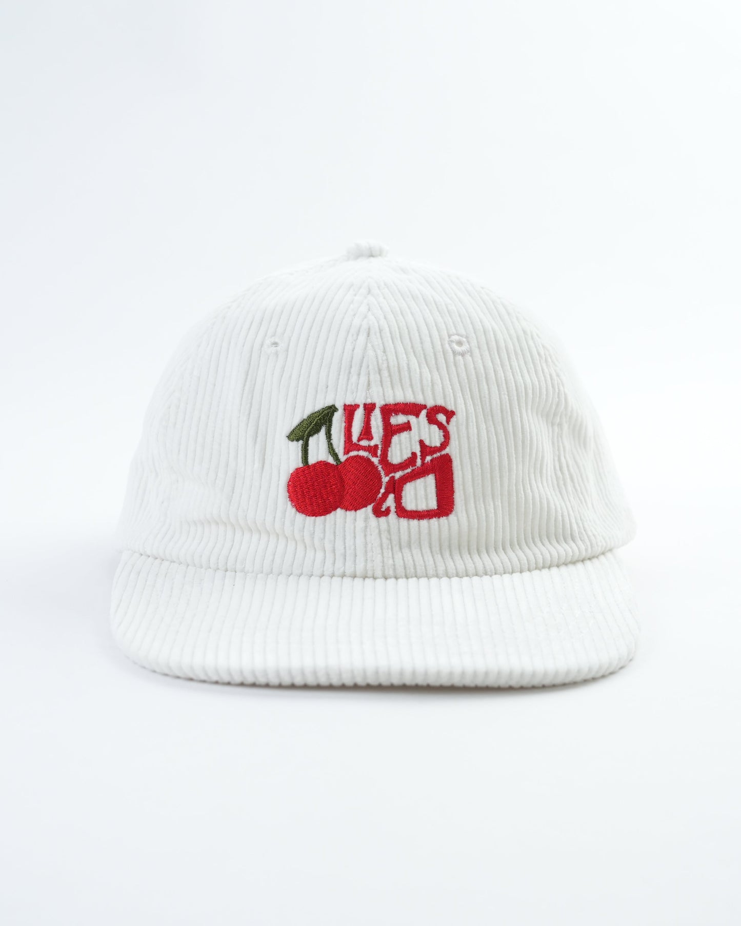 White ribbed baseball cap with cherry patch logo