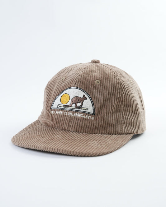 Tan corduroy baseball cap with embroidered animal logo patch and curved brim