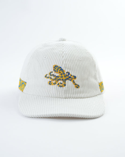 White ribbed cap with blue-yellow octopus patch