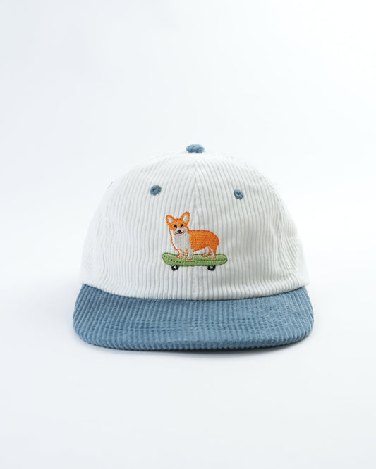 Kids striped baseball cap with orange dog on skateboard patch and blue trim