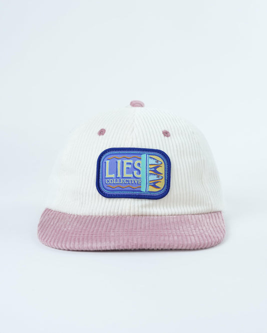Lies Sardine Co. hat with blue front patch, white pinstripes, pink brim and dots