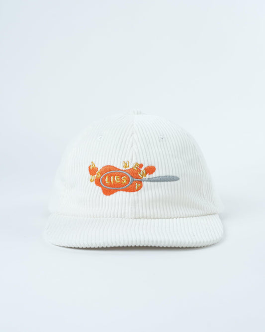 White knit beanie hat with orange crab graphic and gray tongue patch
