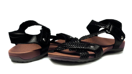 Orthotic sandals in black with strappy braided design and adjustable buckle straps