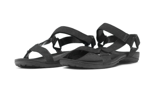 Dark fabric orthotic sandals with crisscross straps and adjustable buckle