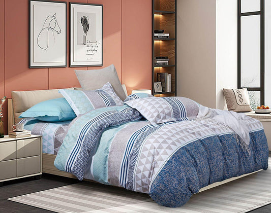 Super king duvet cover set with blue, white geometric print, striped accents, and pillows