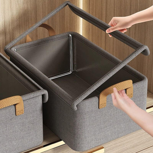 Gray fabric storage cube with lid, open top with metal frame and carry handles