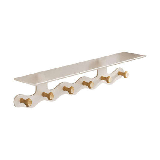 White floating coat rack shelf with wooden coat hooks along the front edge
