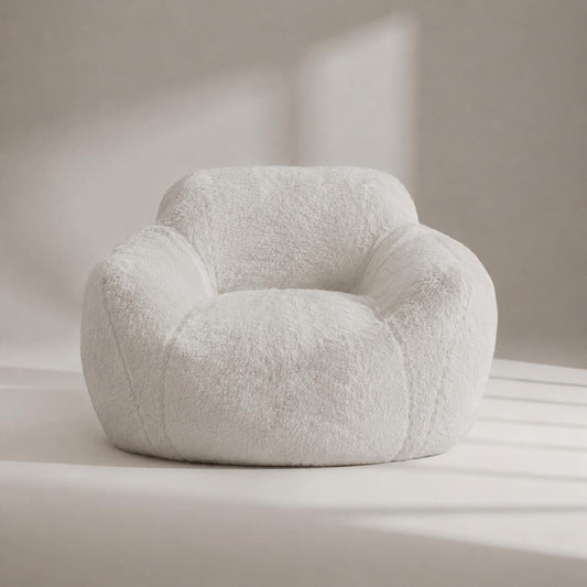 White plush bean bag chair with rounded back and wide seat