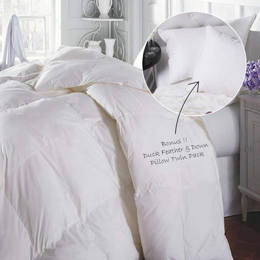 White down pillows set and quilt on bed, with decorative tag