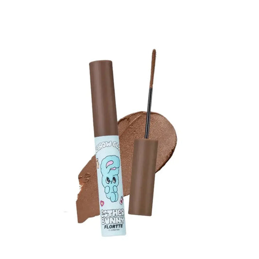 Eyebrow tint tube with applicator brush and tan eyebrow color swatch