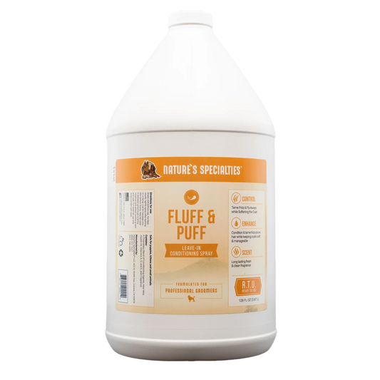 Fluff & Puff re-moisturizing spray bottle, white with orange 'Fluff & Puff' label detail.