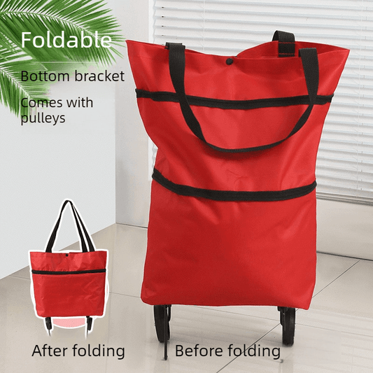 Red foldable shopping trolley with black straps and four wheels, upright bag.