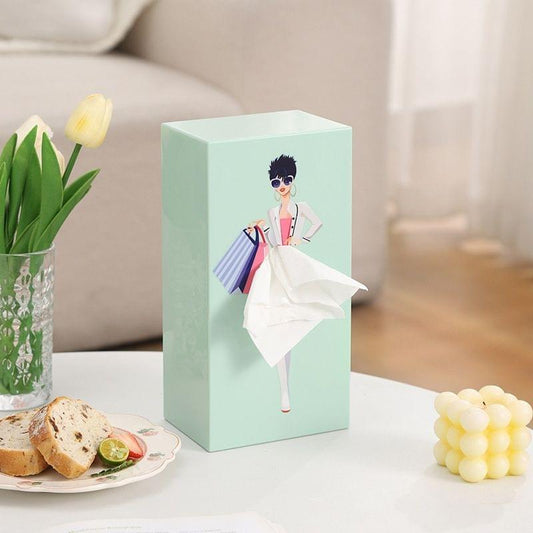 Mint green tissue box holder with dancer illustration on the front