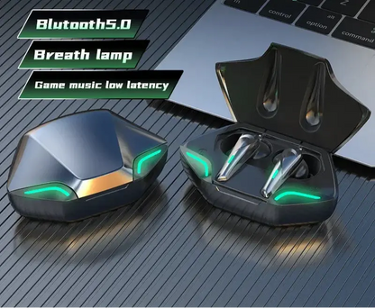 Black wireless gaming earbuds in open case with green LED indicators