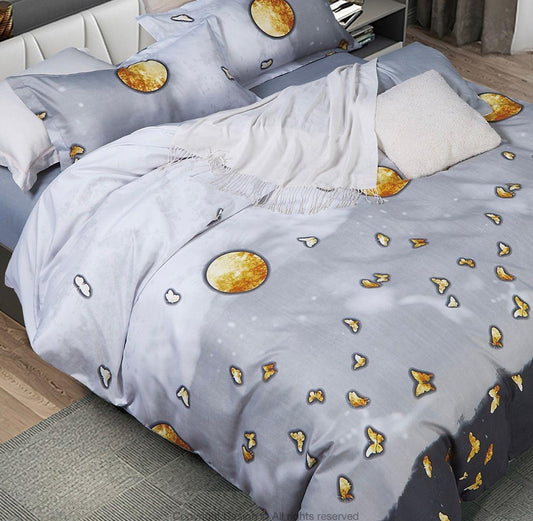 Light blue duvet cover with gold butterfly and circular accents, plus matching pillow