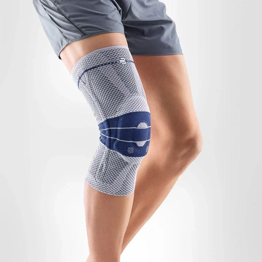 Gray and blue knit knee support with dark blue compression band