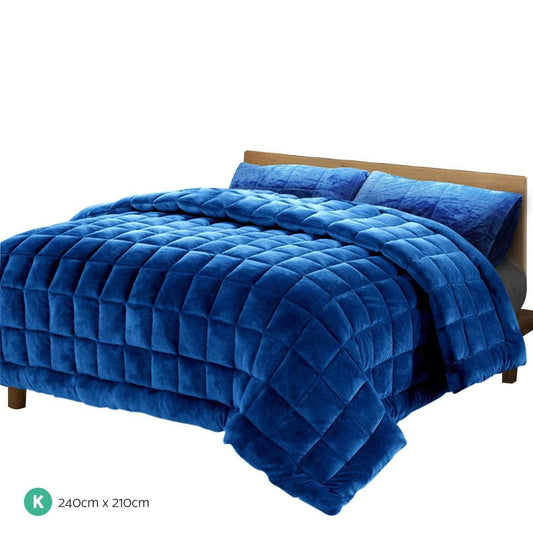 Blue king faux mink quilt with diamond quilting and matching blanket overhang
