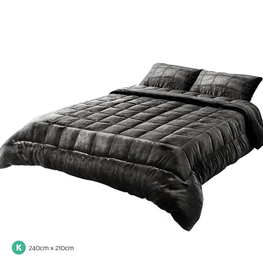 Charcoal faux mink king quilt with diamond quilting and draped corner edge