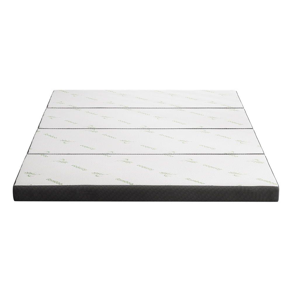 Folded-out queen mattress with white top surface and dark gray side border