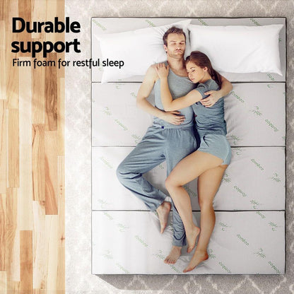 Foldable queen foam mattress with white top, dark gray edges, layered construction