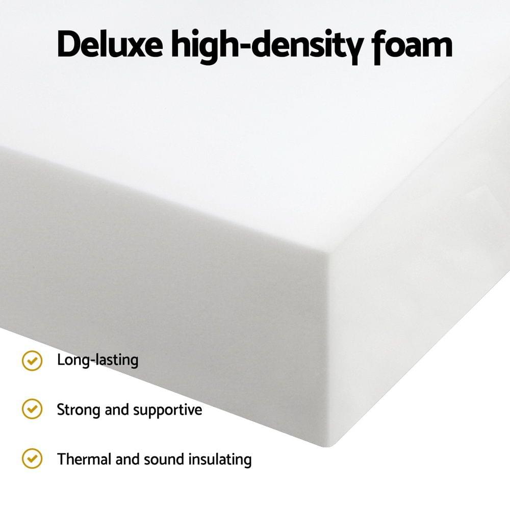High-density foam mattress with white cover and visible dark side wall