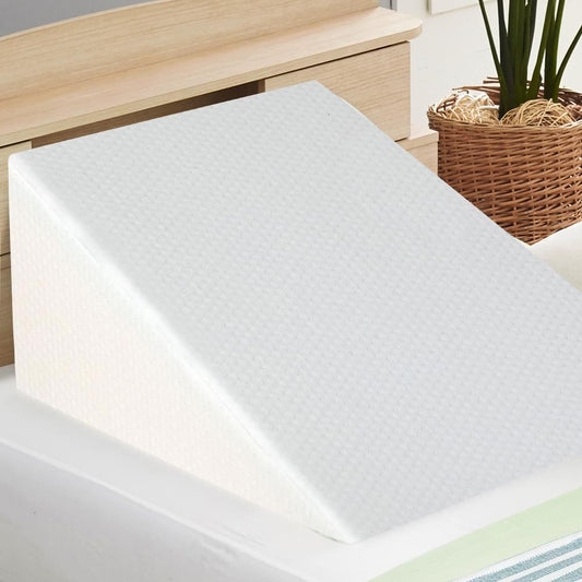 White wedge pillow with textured surface for elevated sleeping support