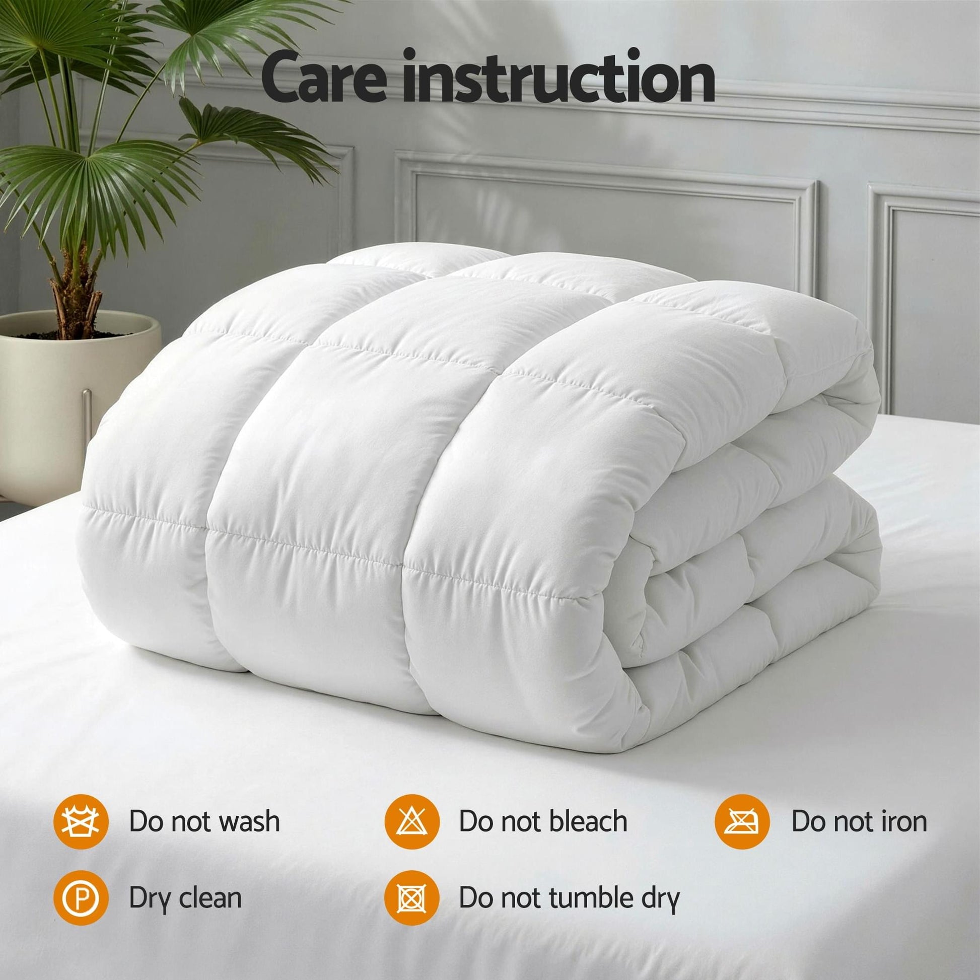 Giselle wool quilt doona, white rolled duvet with care instruction icons